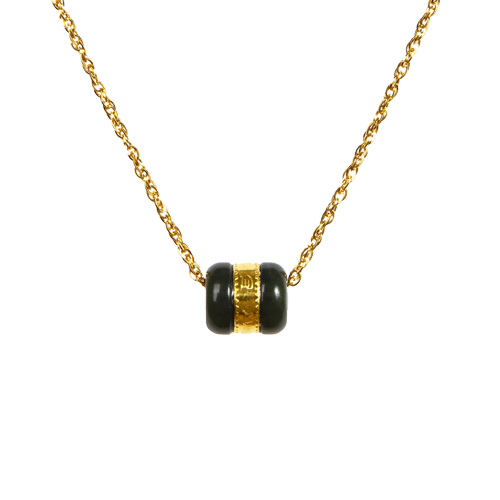 Necklace with black and gold cylindrical pendant on a white background